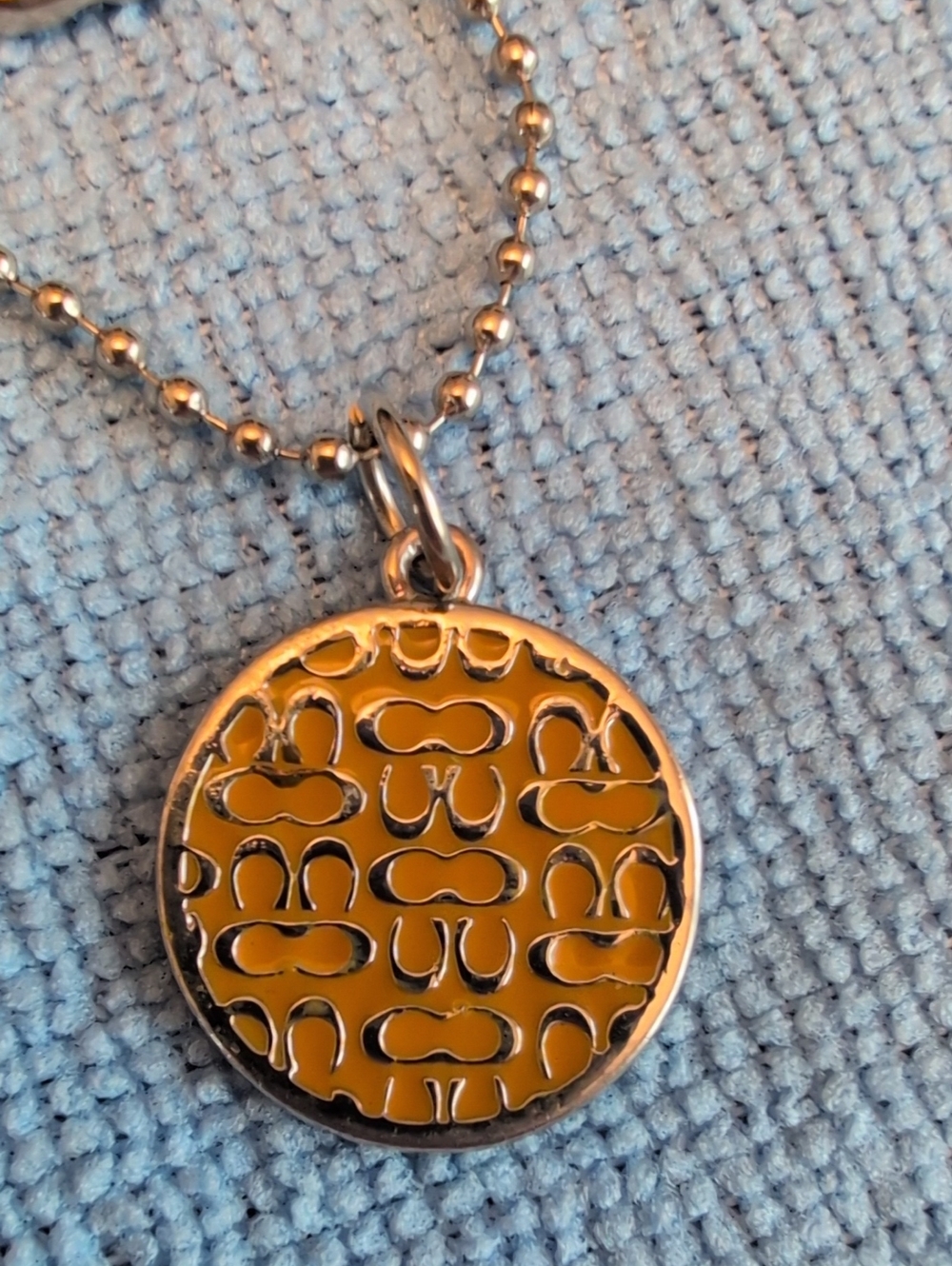 Coach Round Enamel Hangtag
